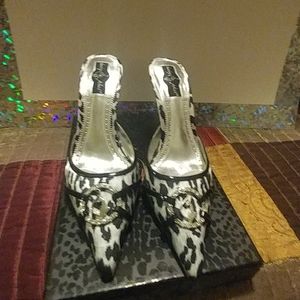 Baby Phat 4 in. White Leopard Mules.